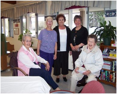 group of elderly ladies smiling