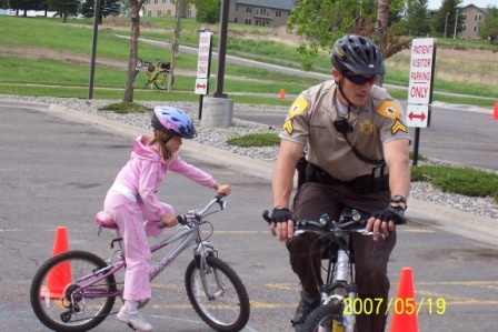 Bike officer with child